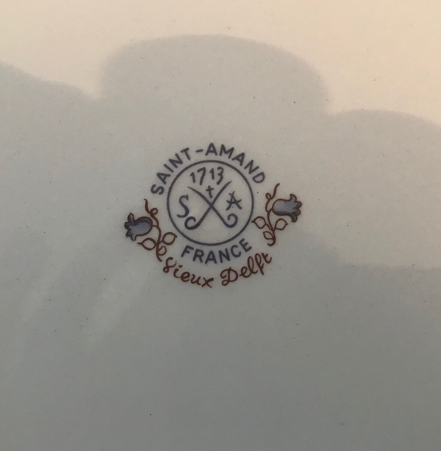 Set of 8 Old Delft Saint Amand plates