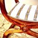 French Empire mahogany office chair with carved detail in the shape of