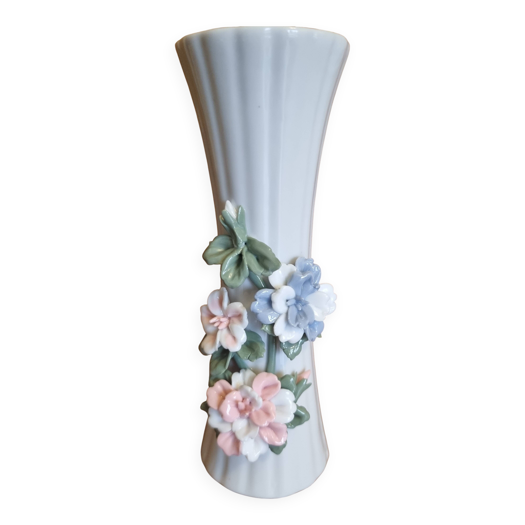 Porcelain vase with flowers in relief