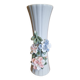 Porcelain vase with flowers in relief