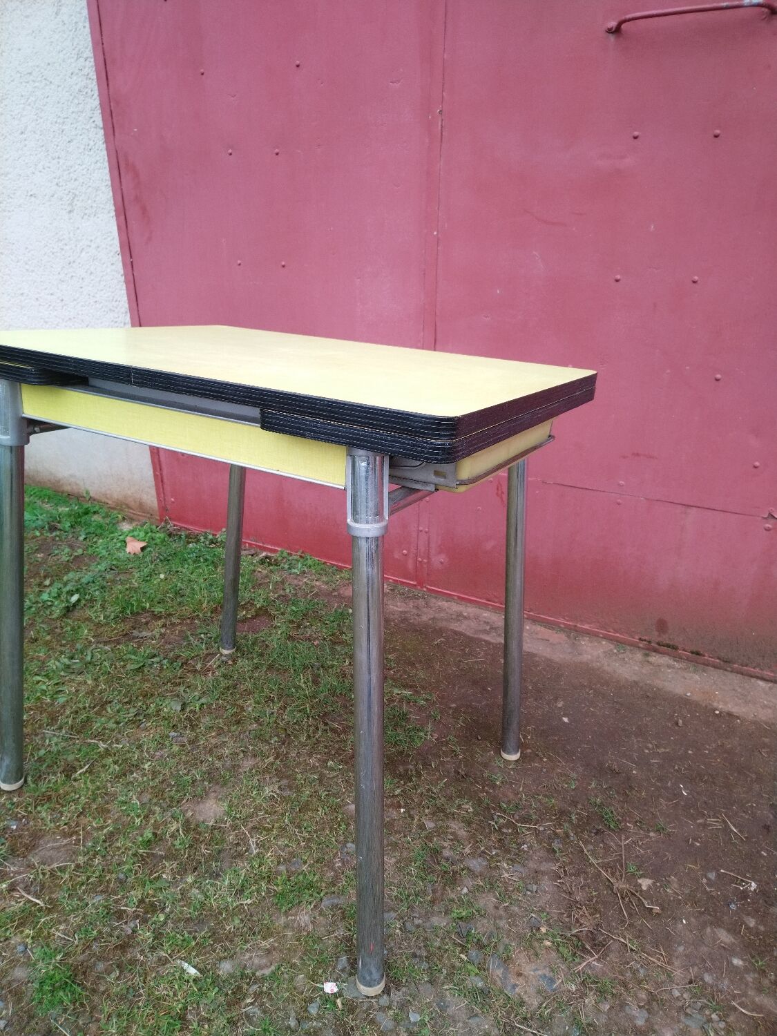 Yellow formica table with extensions