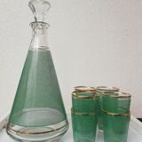 vintage digestive decanter and its matching glasses
