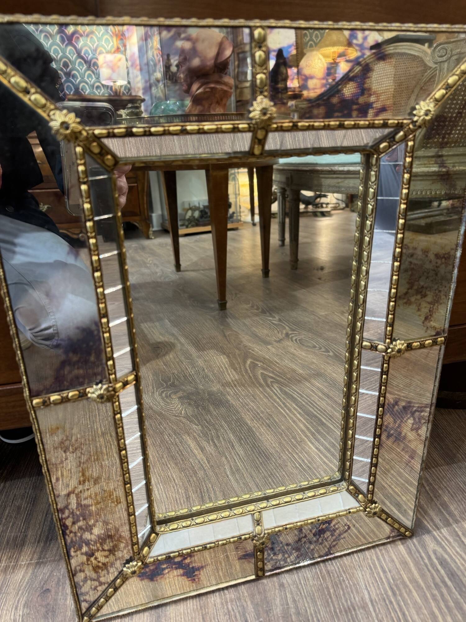 Vintage Venetian mirror with a frame from around 1970.