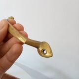 Antique furniture handle in solid brass from the early 20th century