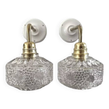 Pair of chiseled glass wall sconces