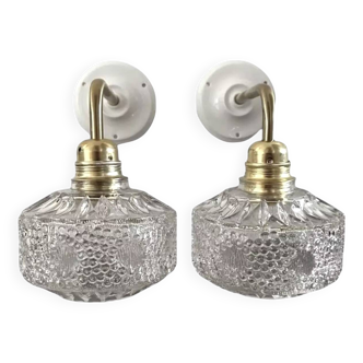 Pair of chiseled glass wall sconces