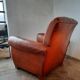 Ancien fauteuil club en cuir, vers 1940 style art déco