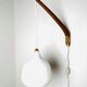 Model 705 Wall Lamp In Teak And Opaline Glass By Uno & Östen Kristiansson For Luxus, Sweden 1960S
