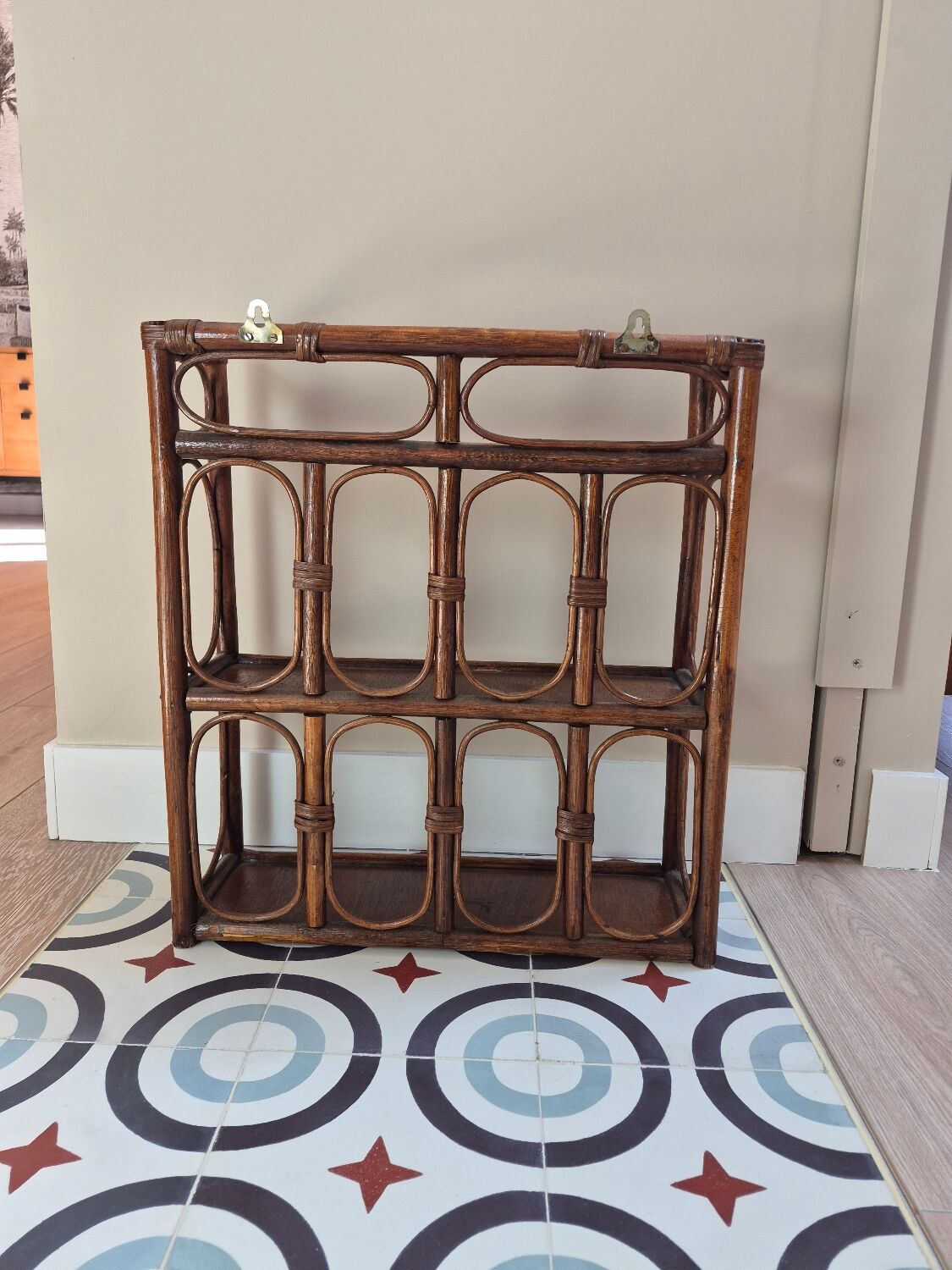 Wall shelf and rattan