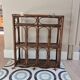 Wall shelf and rattan