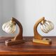 Pair of vintage 1970s mid-century Scandinavian lamps with amber globe.
