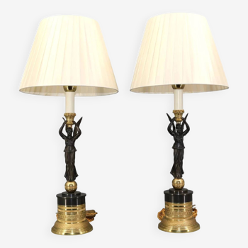 Pair of "victory" lamps in gilded bronze & patinated pleated lampshade