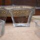 Art Nouveau serving dish plated in copper with removable glass inserts.
