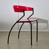 Red Plywood and Curved Metal Frame Chair
