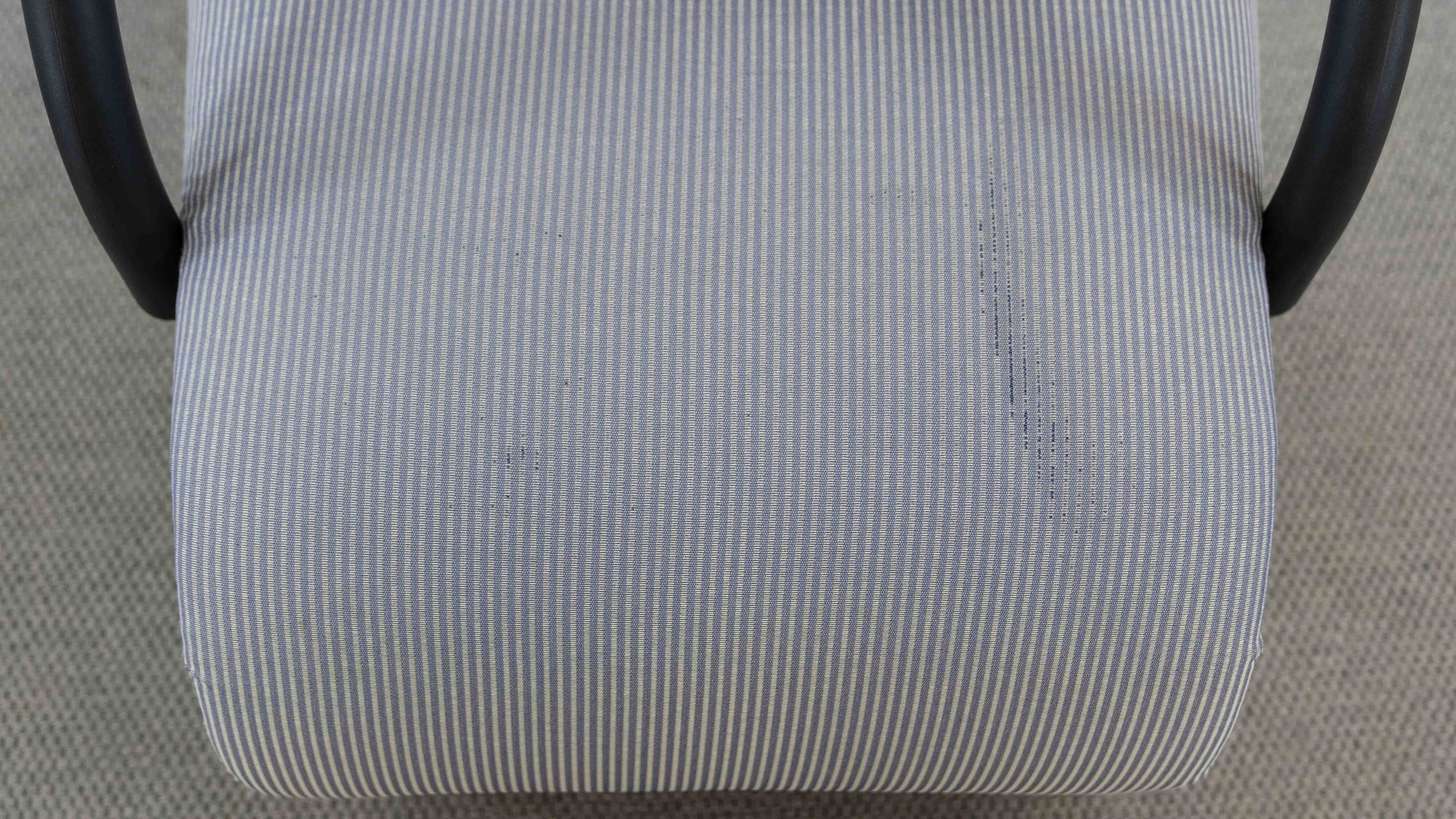 Zen easy chair with footrest by claude brisson for ligne roset