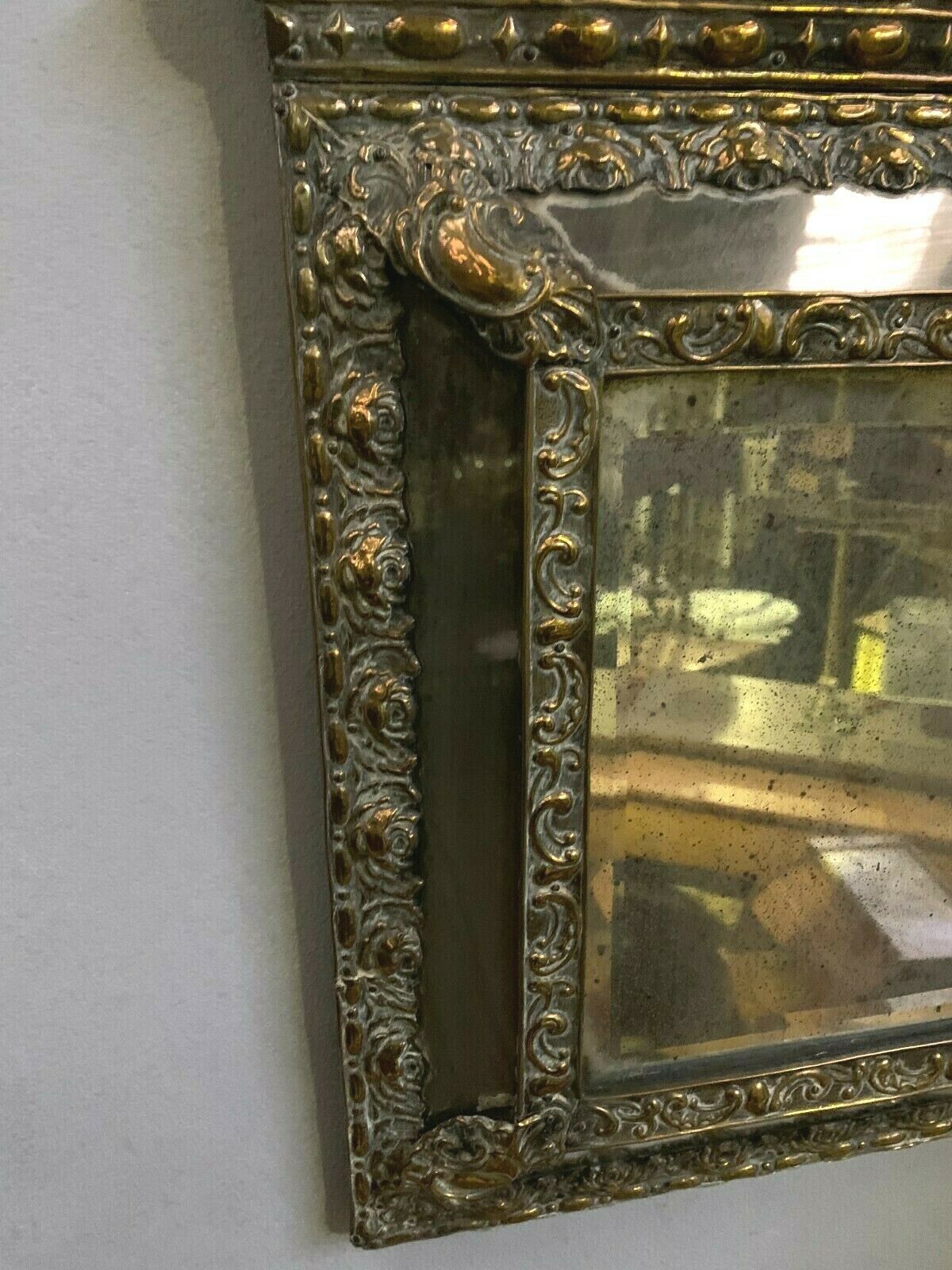 Mirror by-close copper repulsed 19th century h 59 X l 34 cm