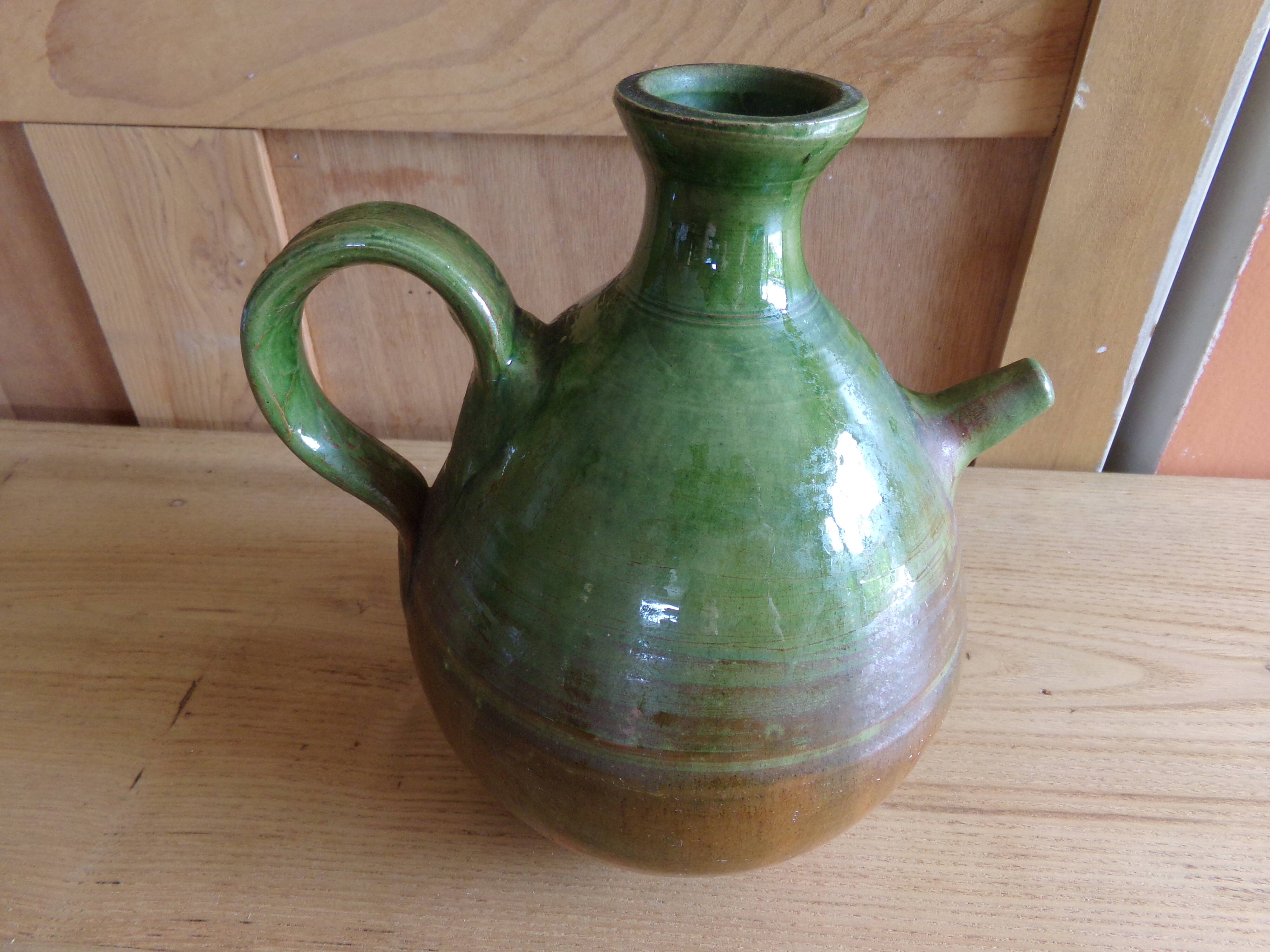Enamelled terracotta jug