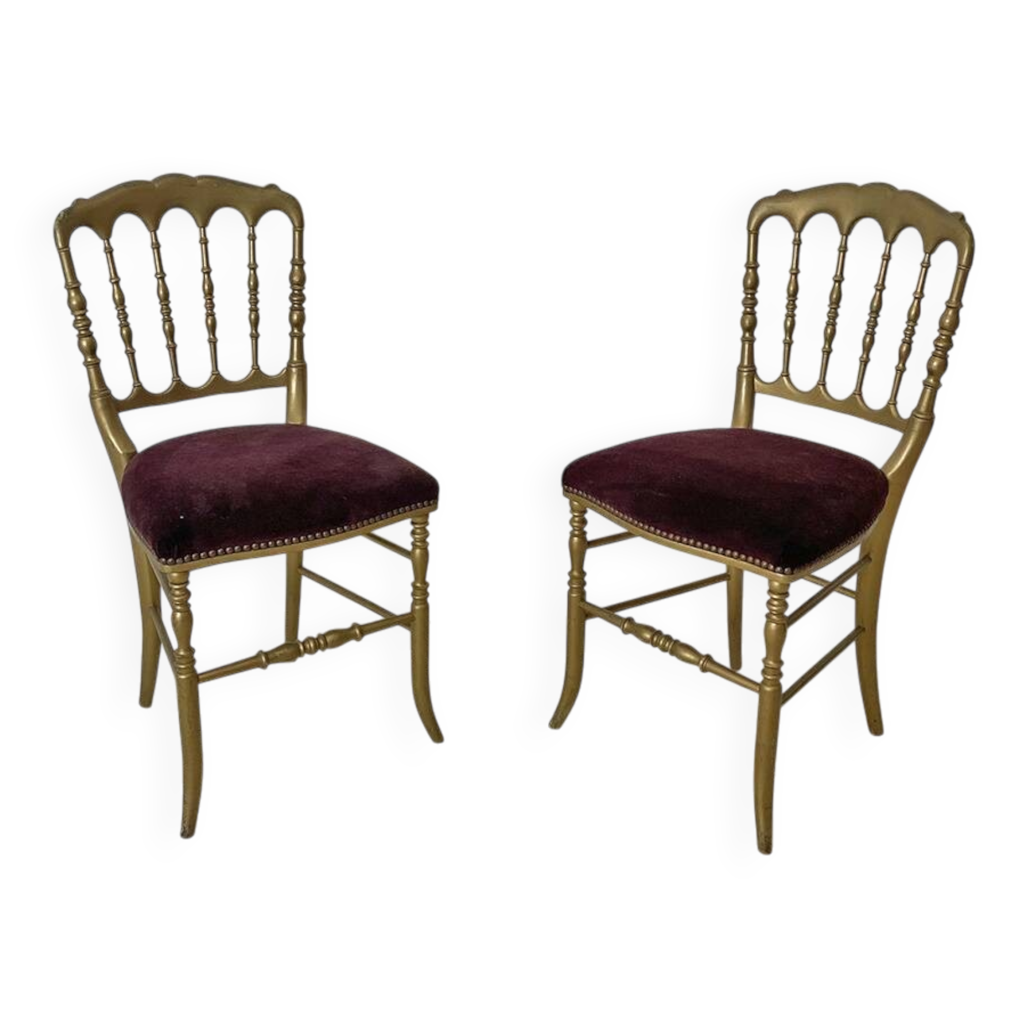 Pair of charivari chairs in gilded wood
