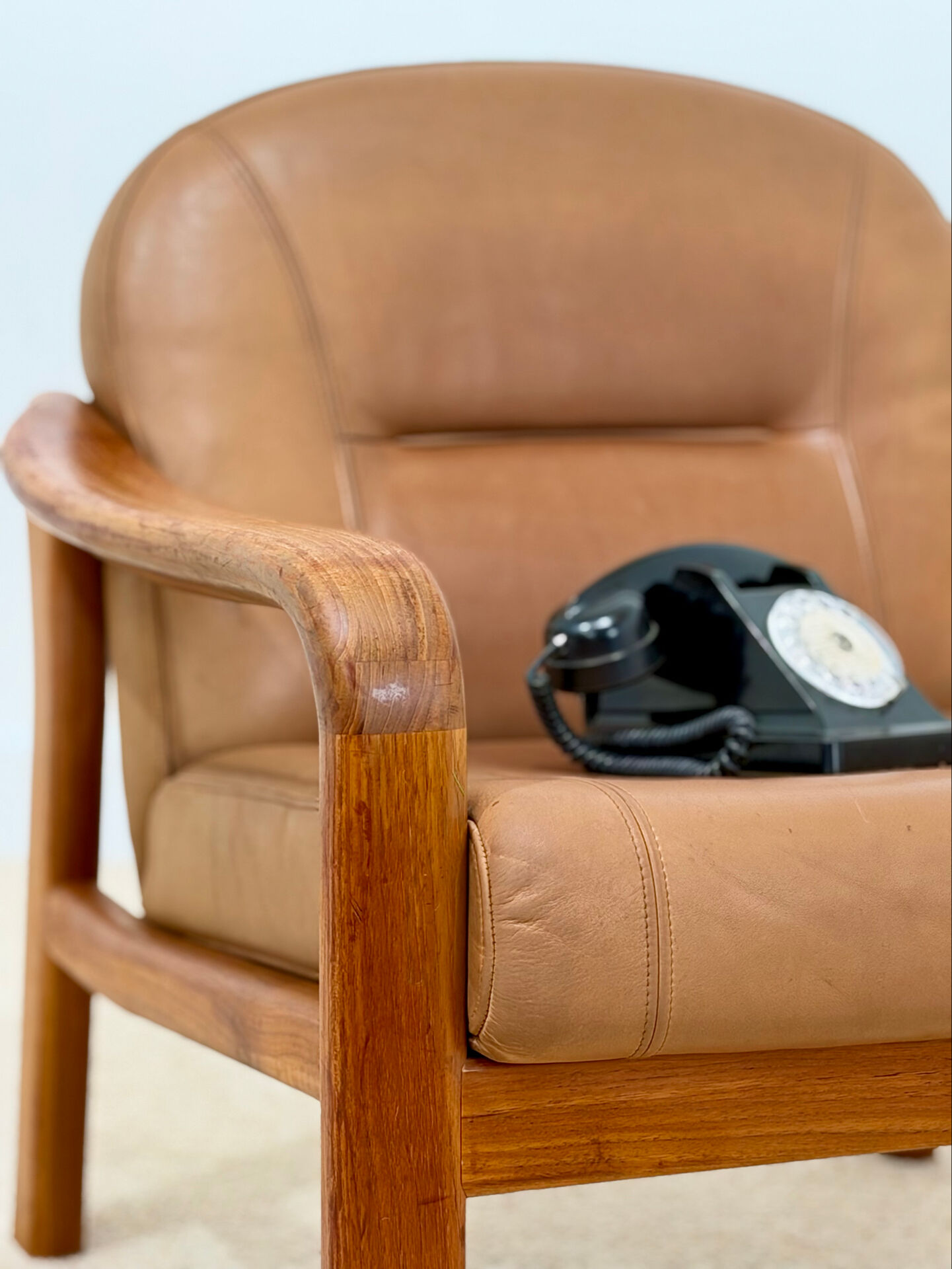 Vintage leather and wood armchair – 1970s