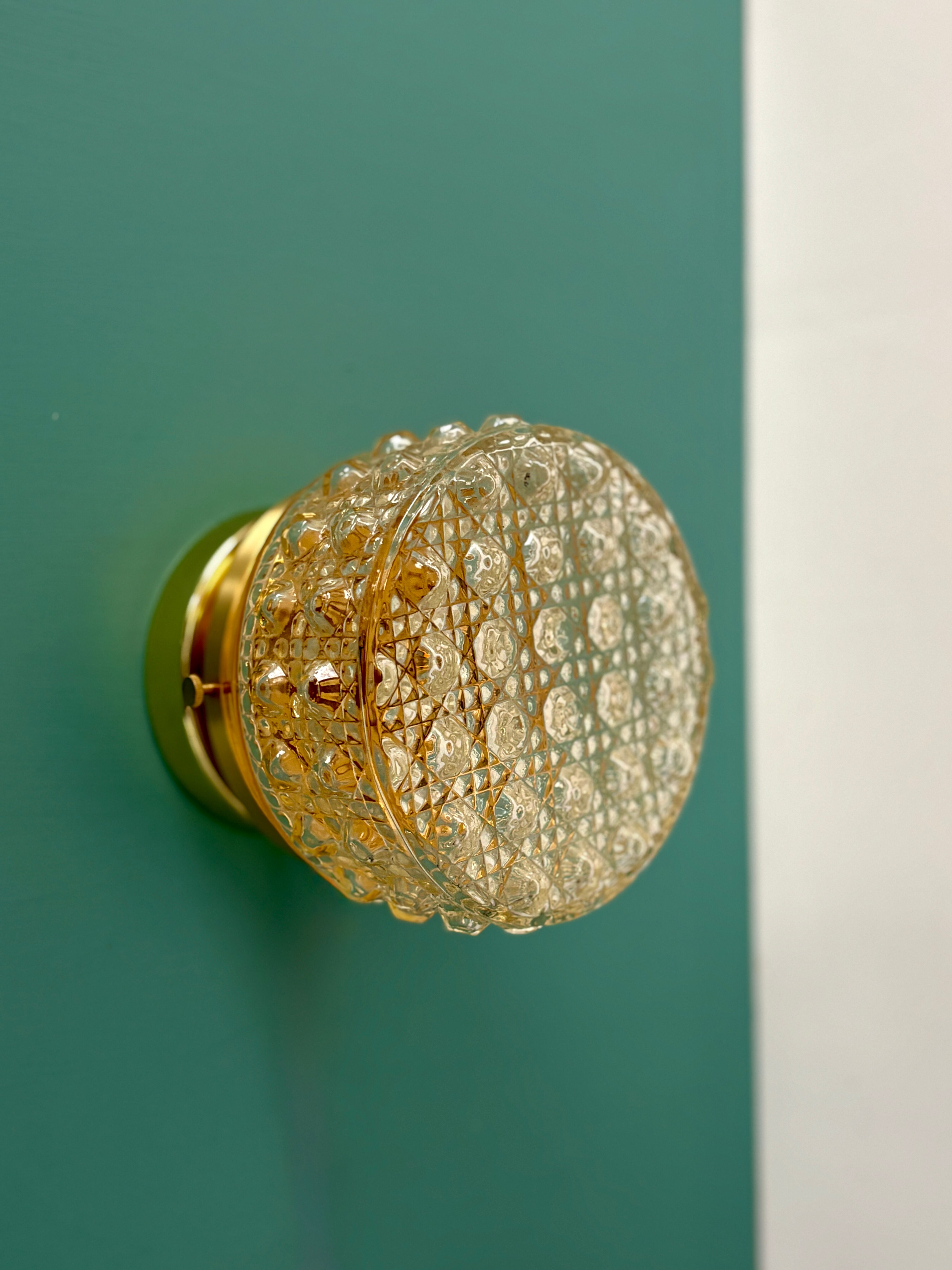 Vintage glass moulded globe wall/ceiling light.