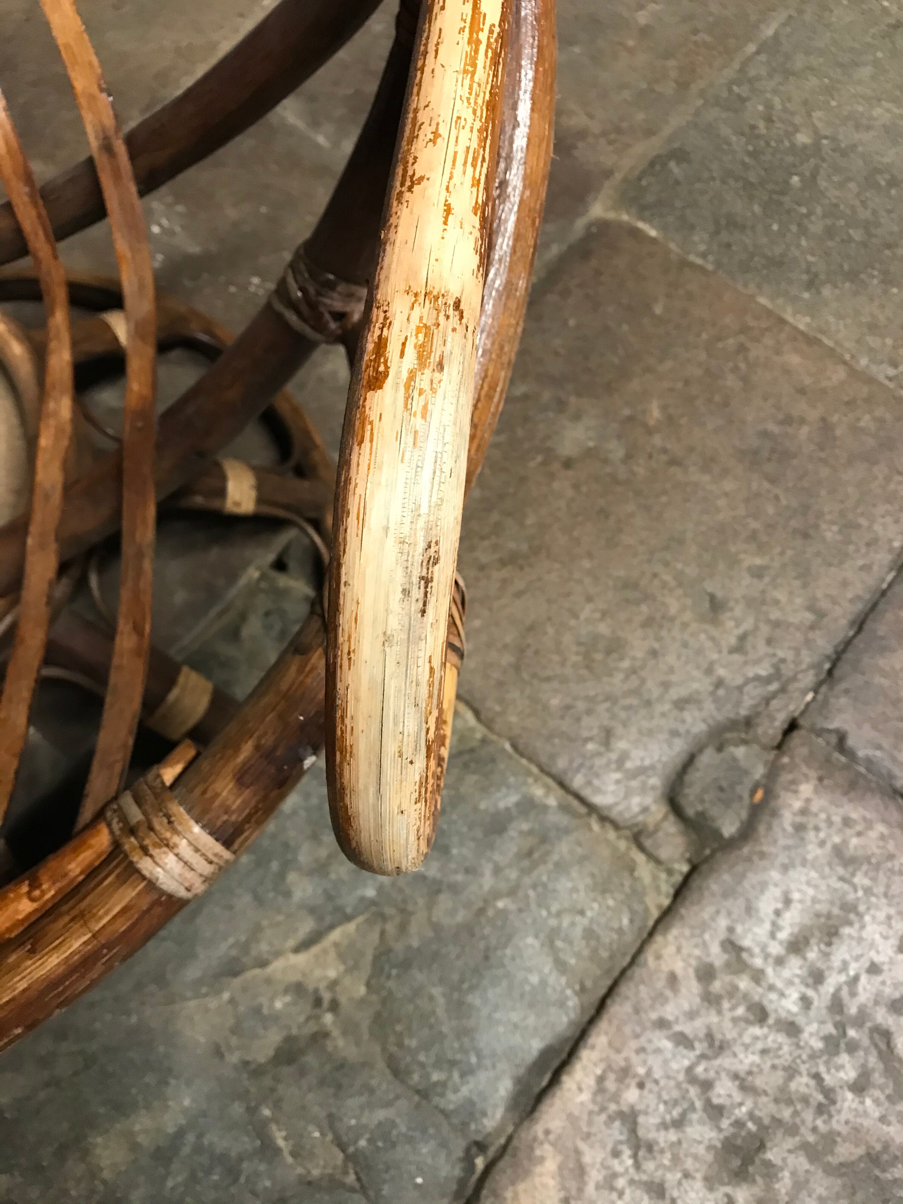 Swivel rattan armchair