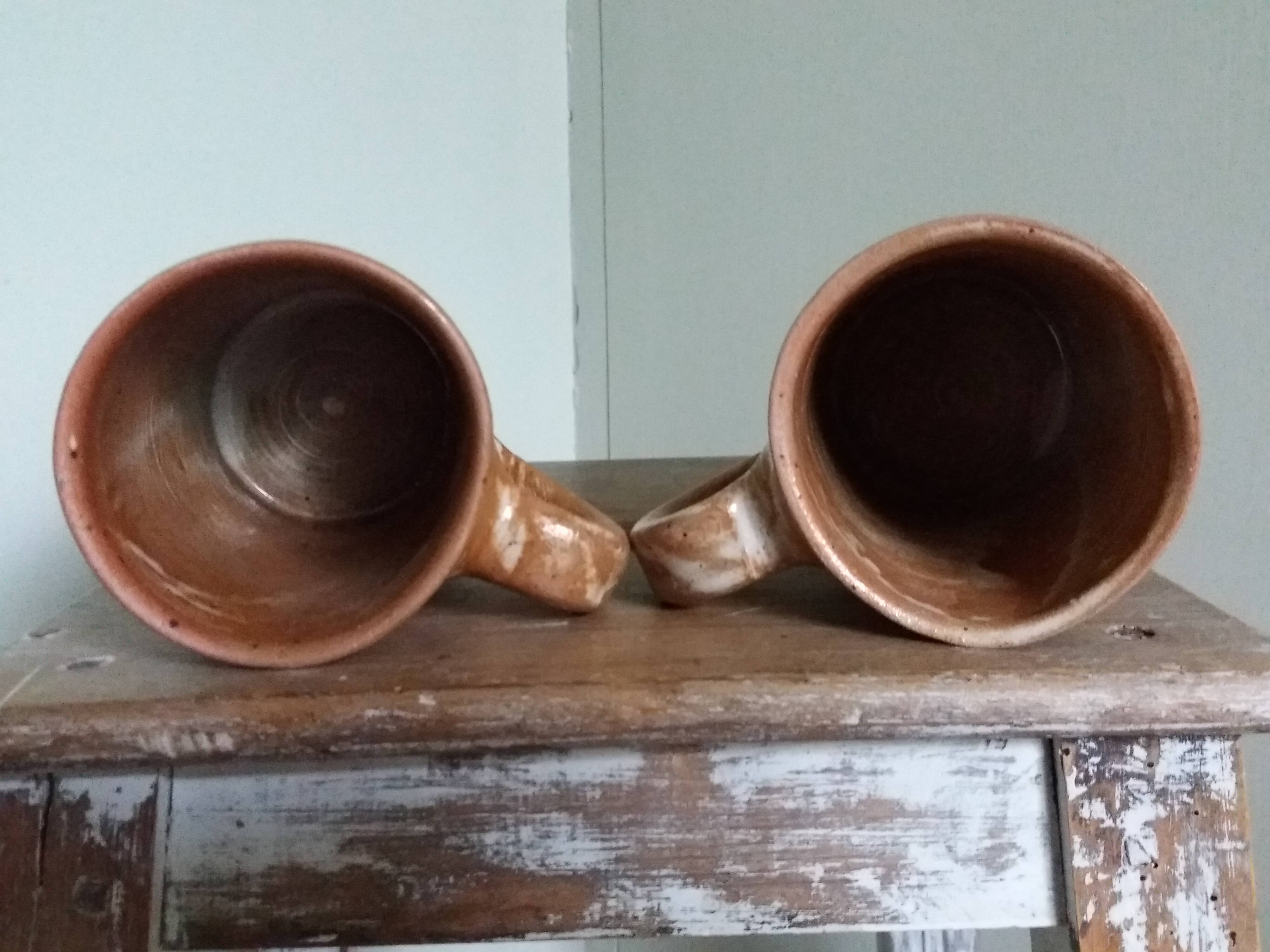 Enamelled stoneware mugs