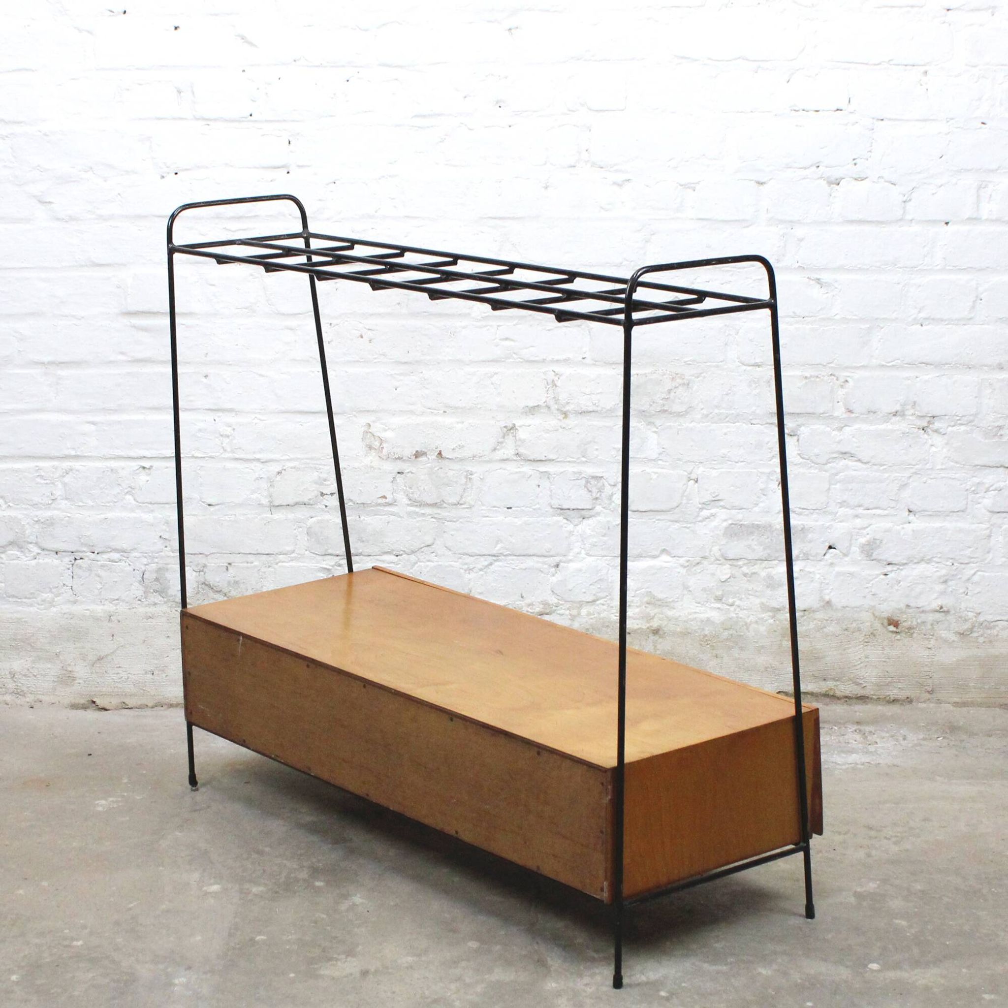 Vintage wood and lacquered metal storage unit.