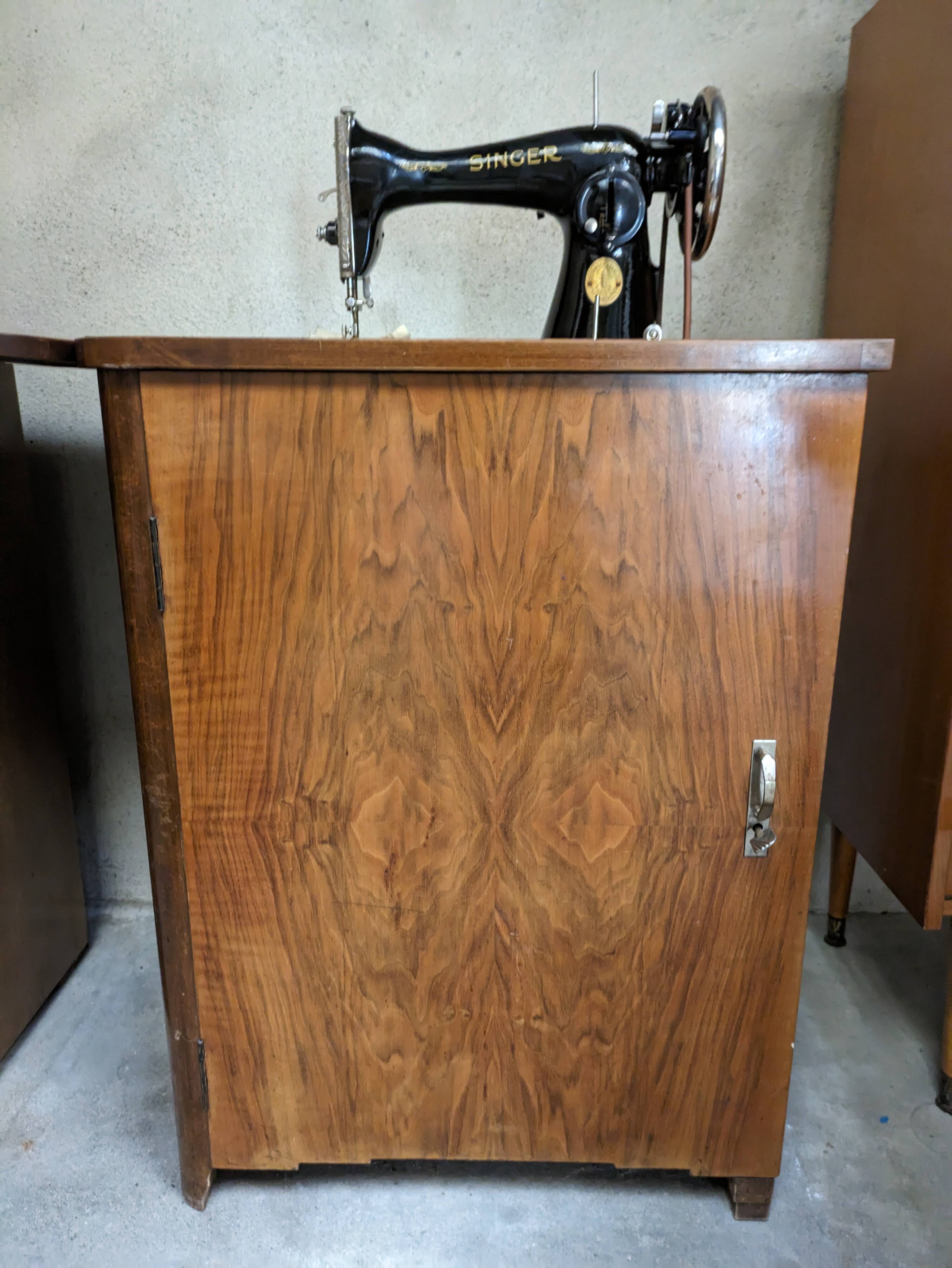 Singer sewing machine in its cabinet
