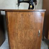 Singer sewing machine in its cabinet