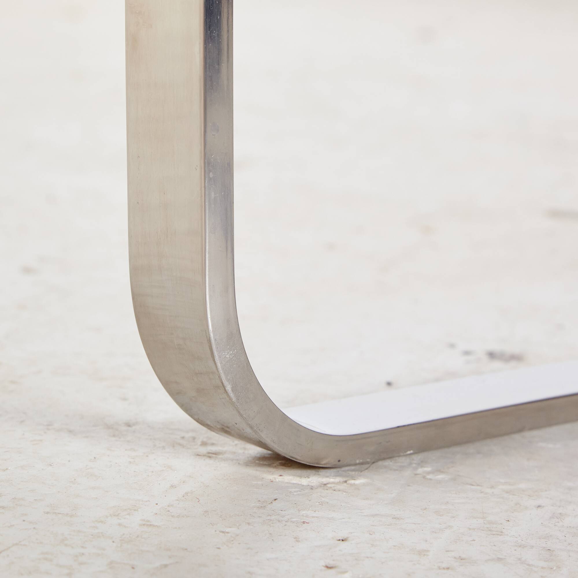 Steel armchair with leather upholstery