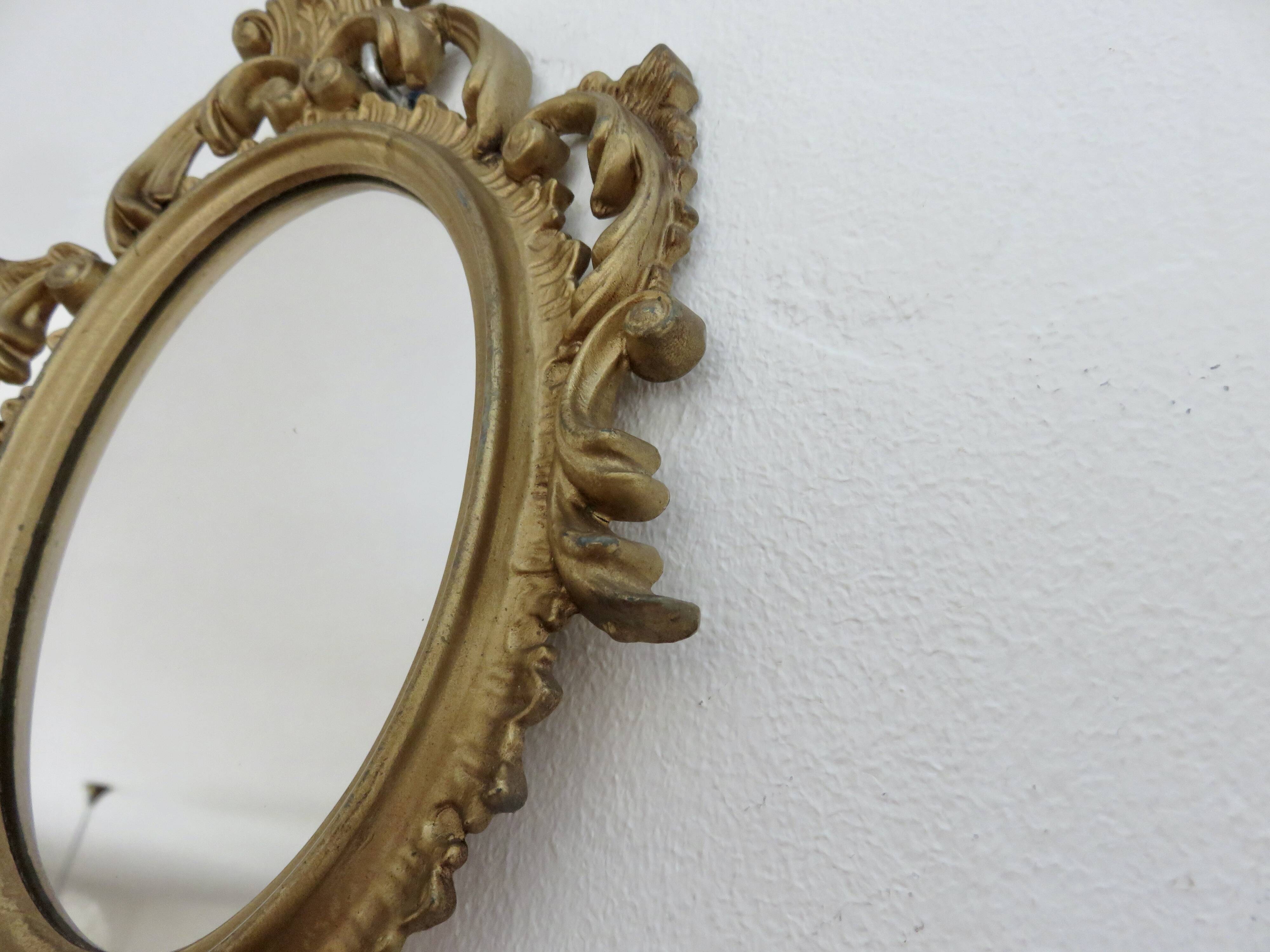 Small baroque mirror in gilded resin, made in Italy, 1970