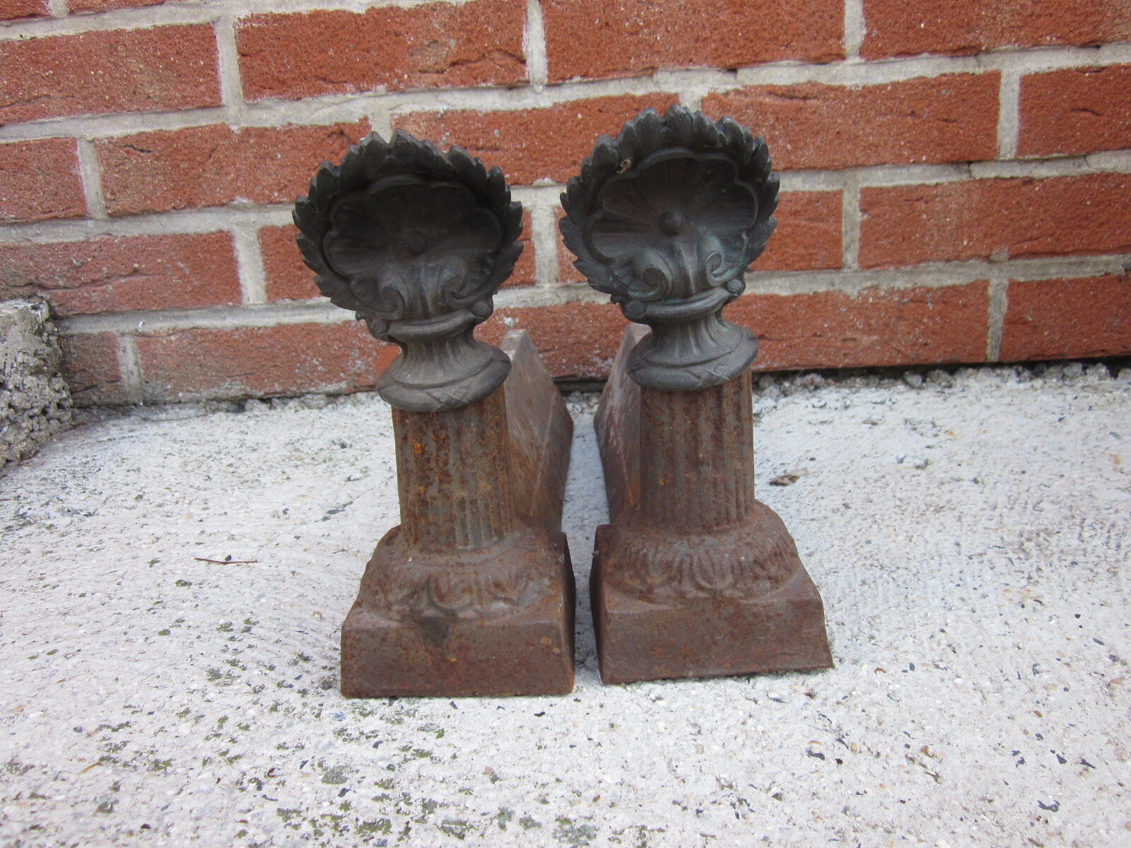 Pair of old cast-iron and bronze chenet