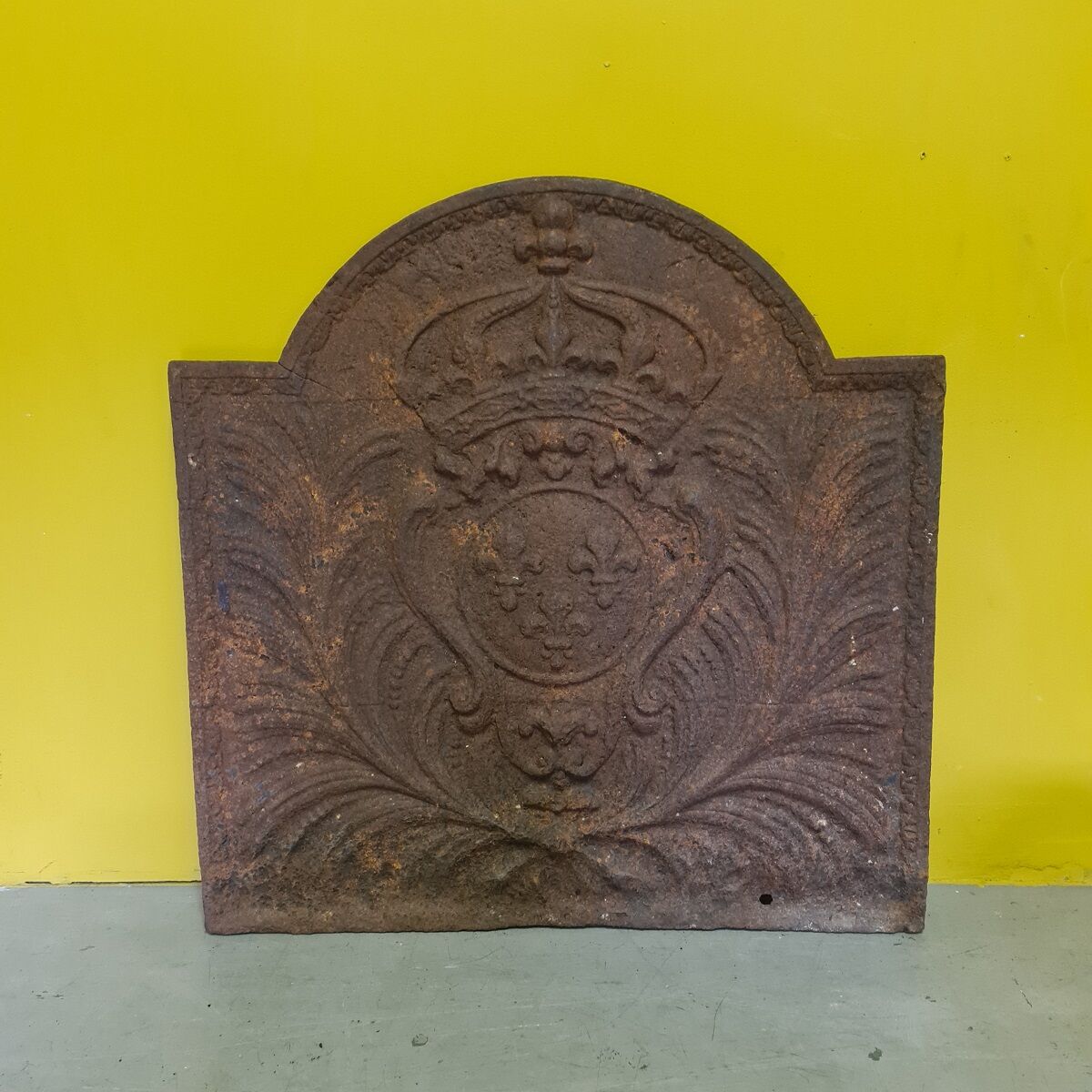 Cast iron fireback with the crowned arms of France