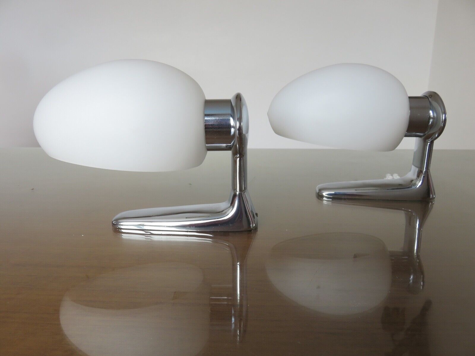 Wall lamps in chromed metal and opaline glass
