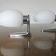 Wall lamps in chromed metal and opaline glass