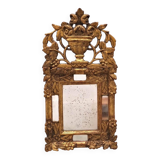 Regency style beaded mirror in carved and gilded wood, early 19th century