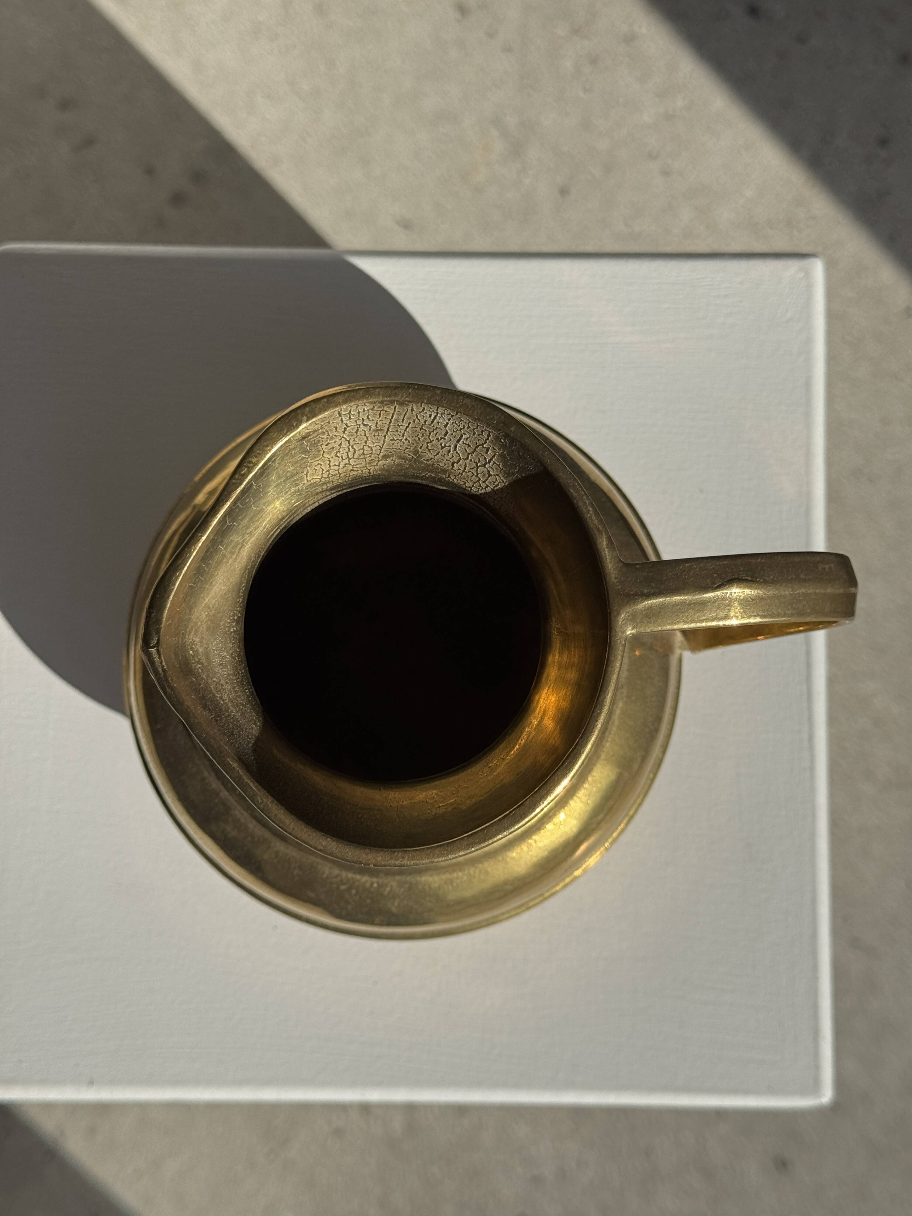 Carafe or metal jug with a rounded body H18
