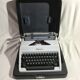 Machine à ecrire Olympia métal gris avec malle noire germany vintage