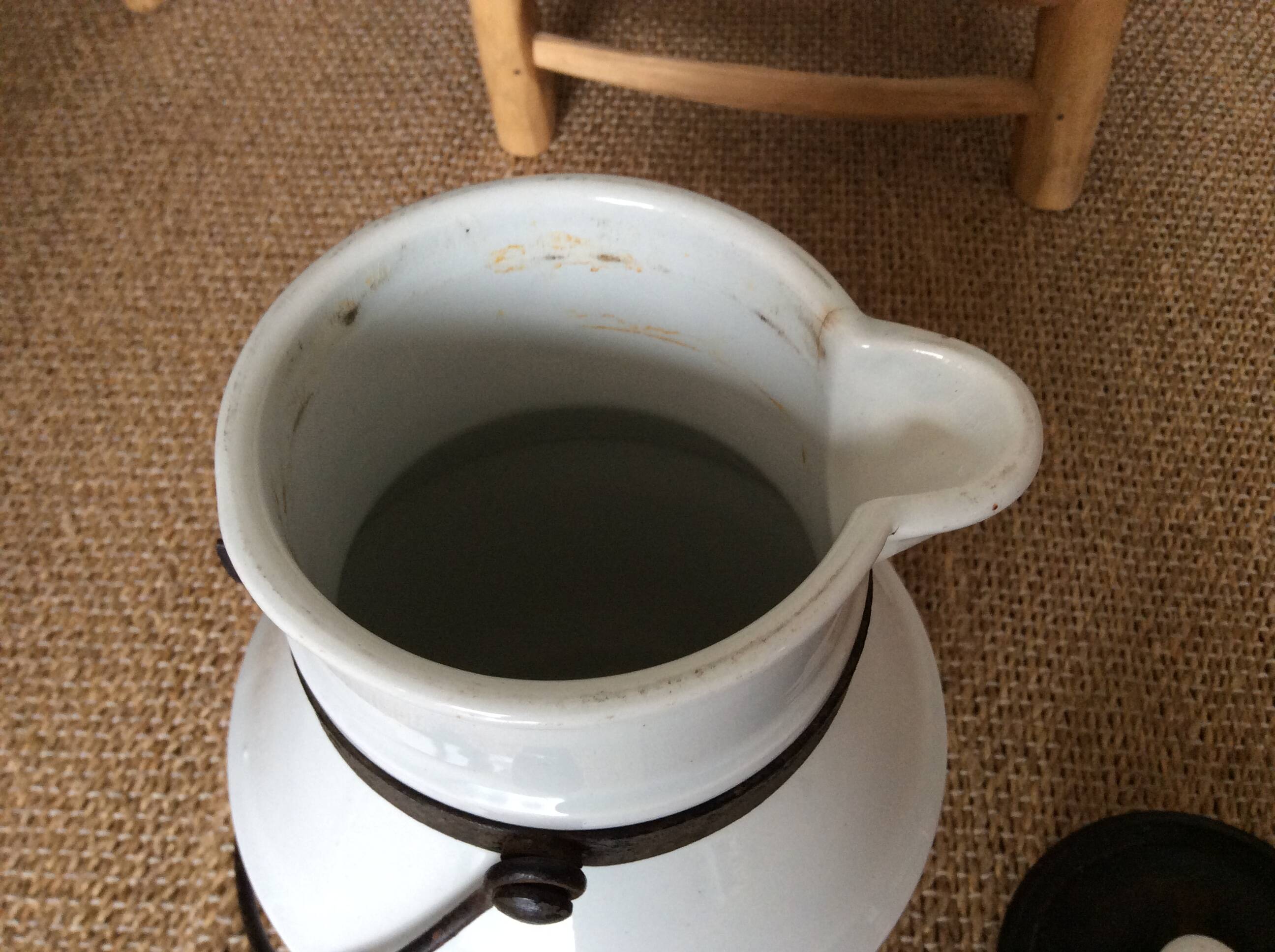 Antique milk jug