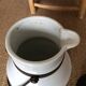 Antique milk jug
