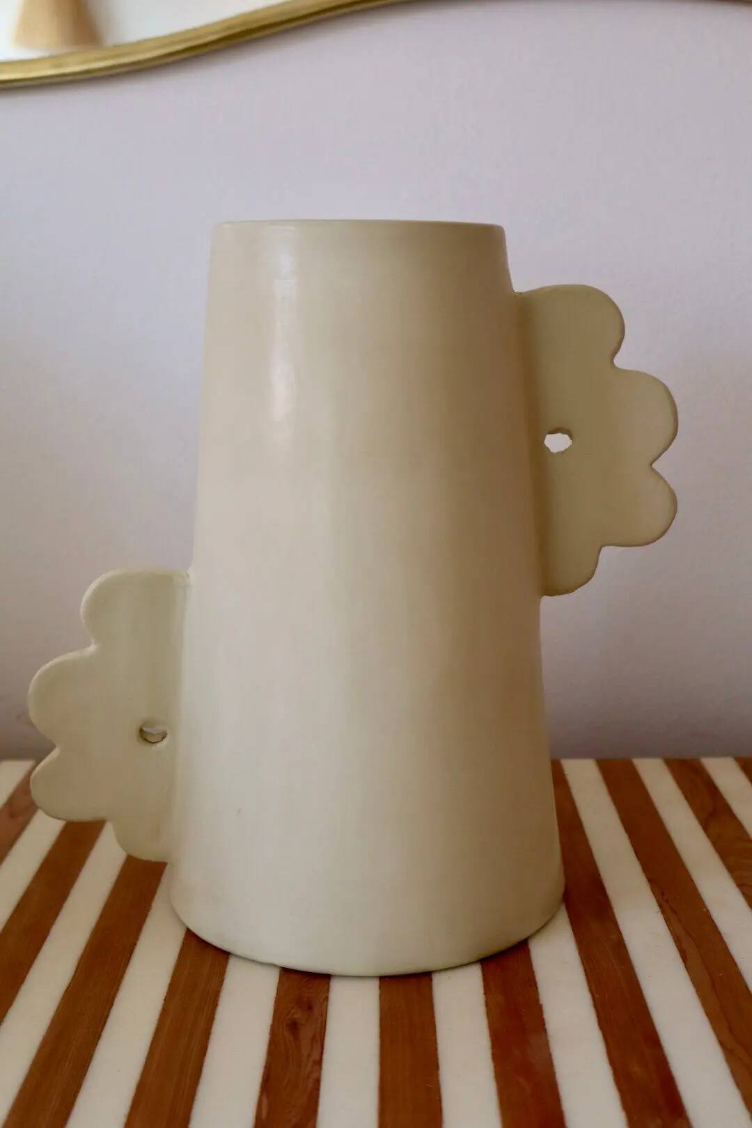 Abstract handmade ceramic vase with off-white matte floral design - daisy