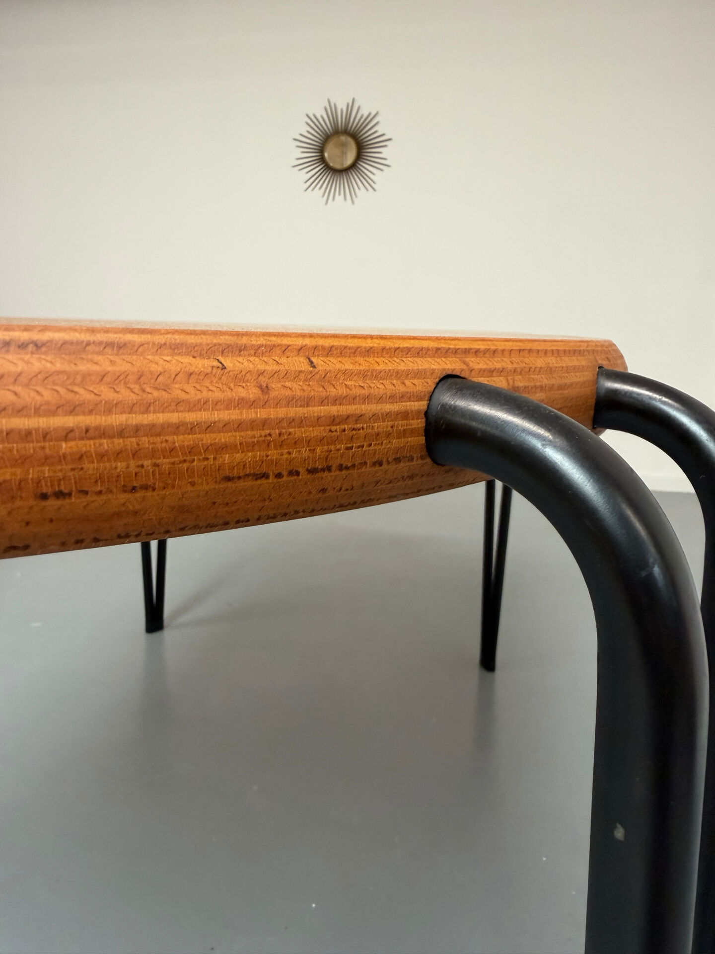 Solid wood dining table with tubular legs, 1980s postmodern design.