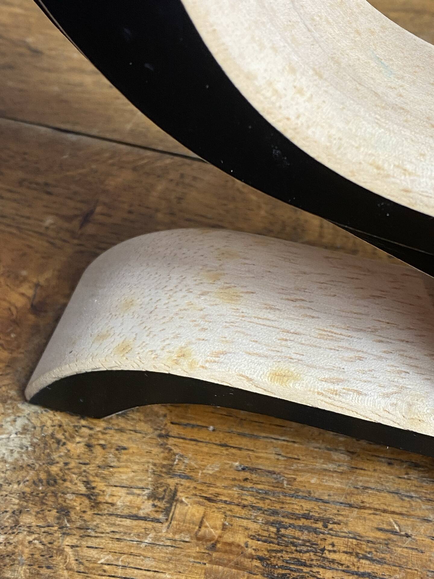 Foldable and deconstructed chandelier, minimalist Swedish design in wood.