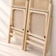 Paire de chaises pliantes en cannage et bois