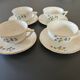 charming set of 4 cups and their 4 matching saucers in earthenware