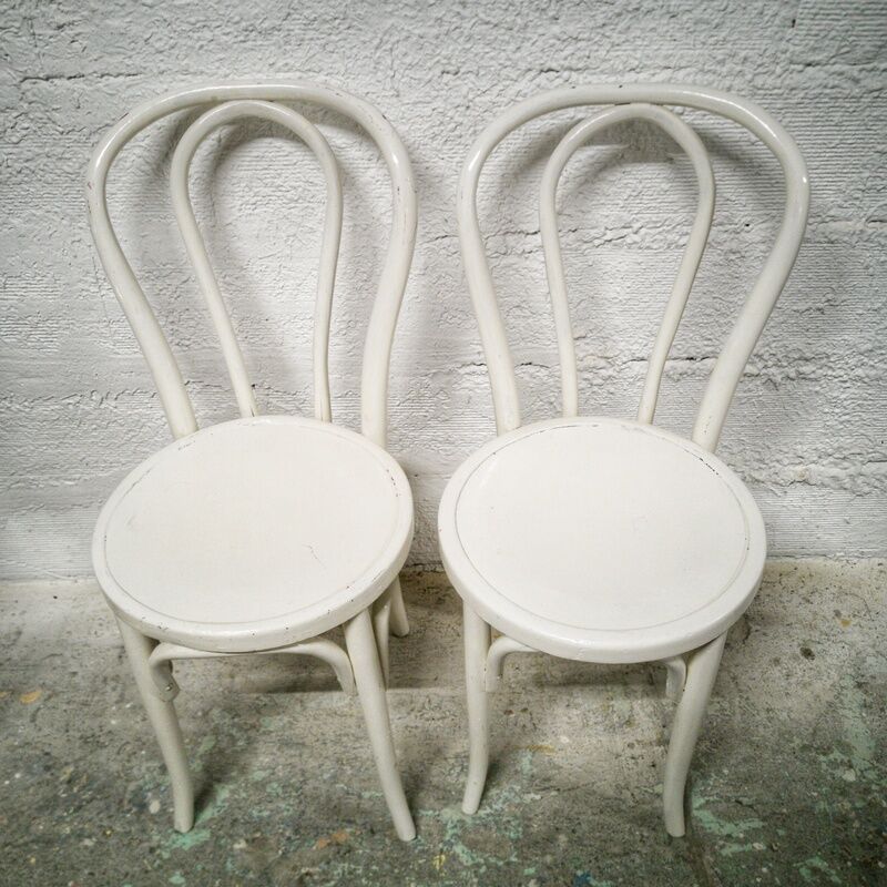 Pair of white Baumann bistro chairs