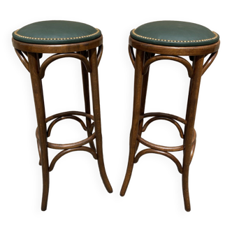 pair of curved wood bar stools