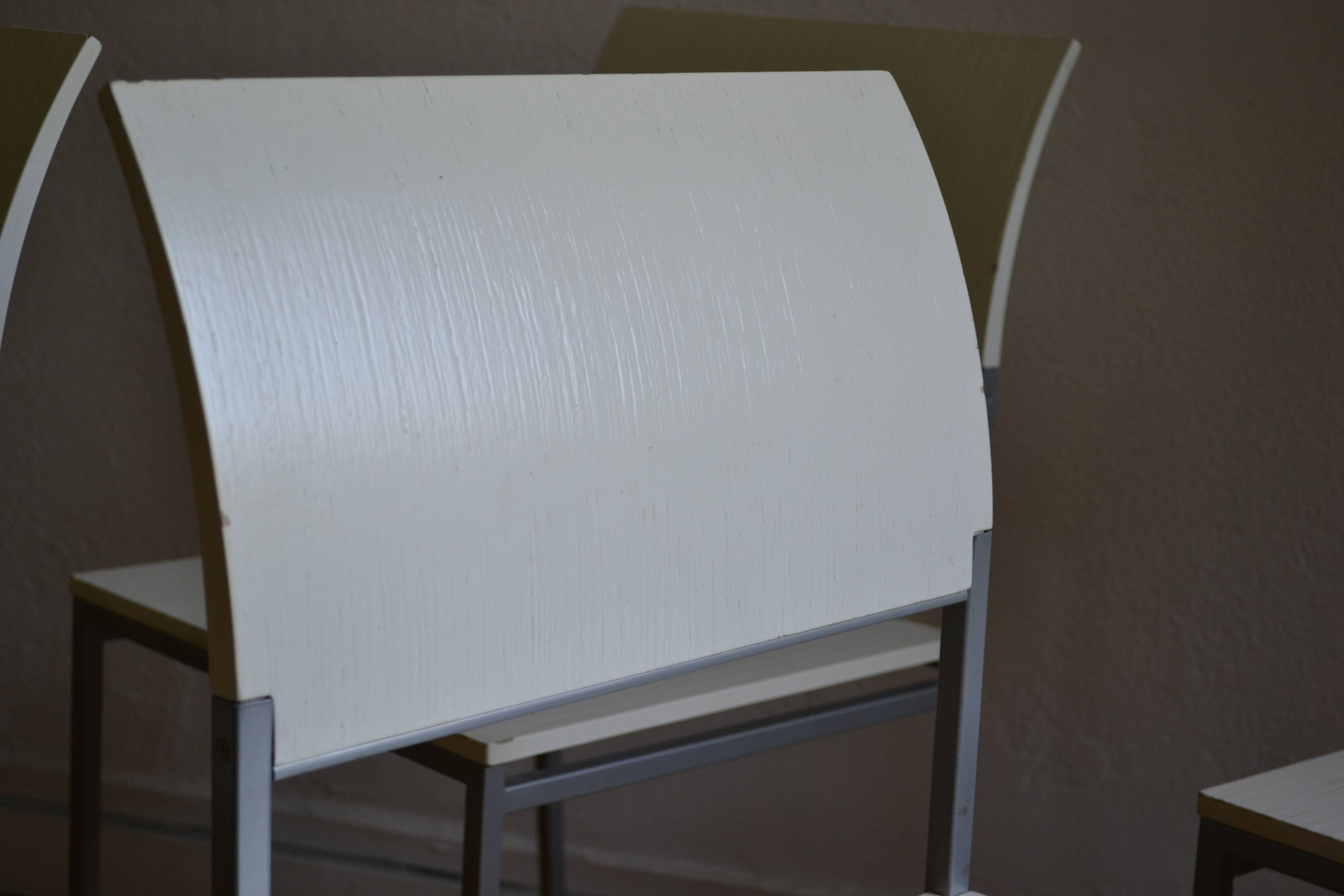 Set of 4 vintage metal and wood chairs from the 1990s.