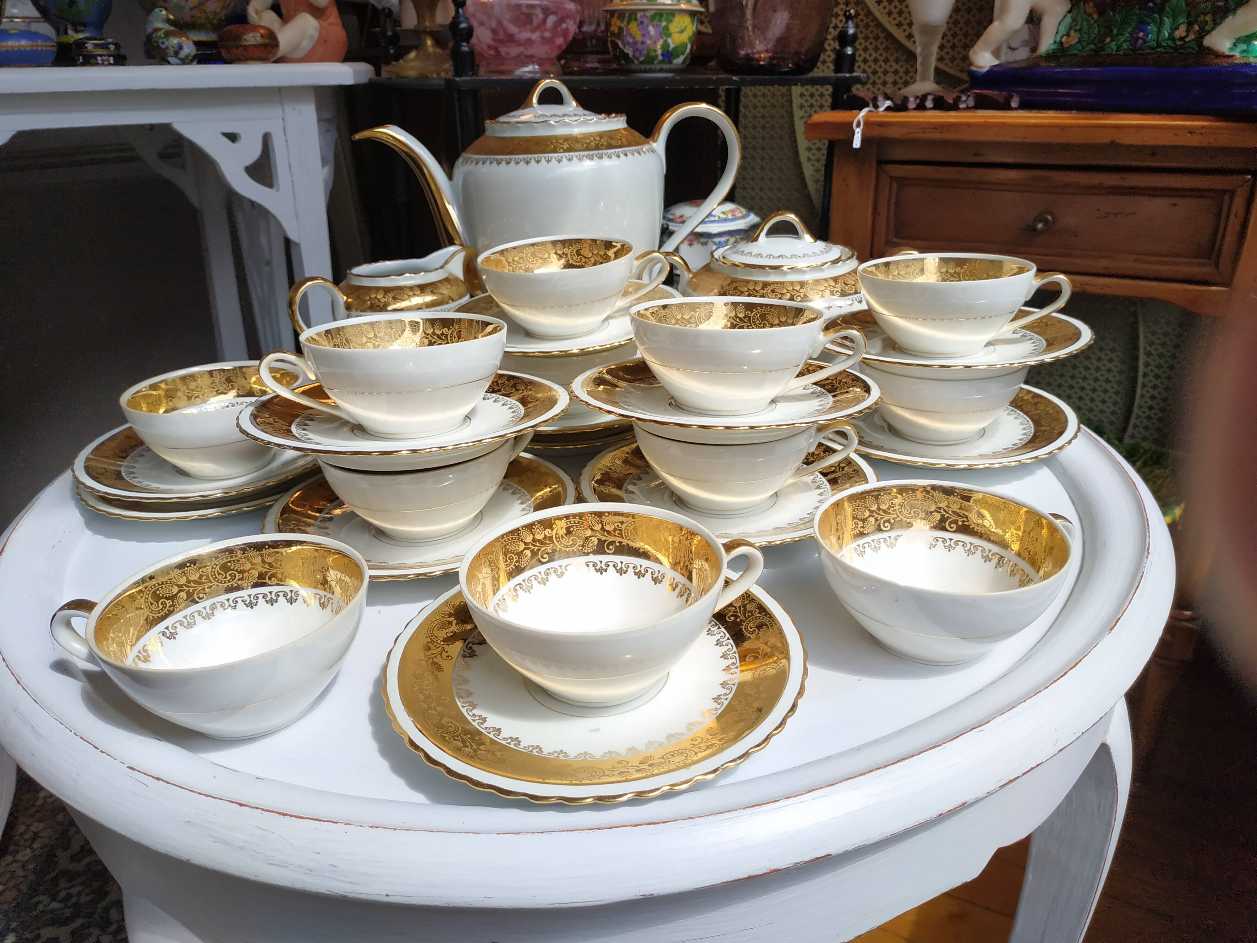 Coffee service 12 cups in white and gold porcelain