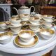 Coffee service 12 cups in white and gold porcelain